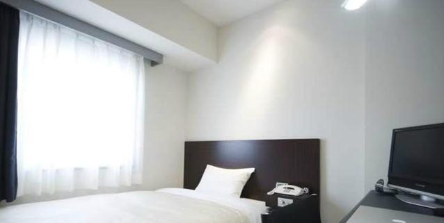 Hotel Mid In Akabane Ekimae Tokió Szoba fotó